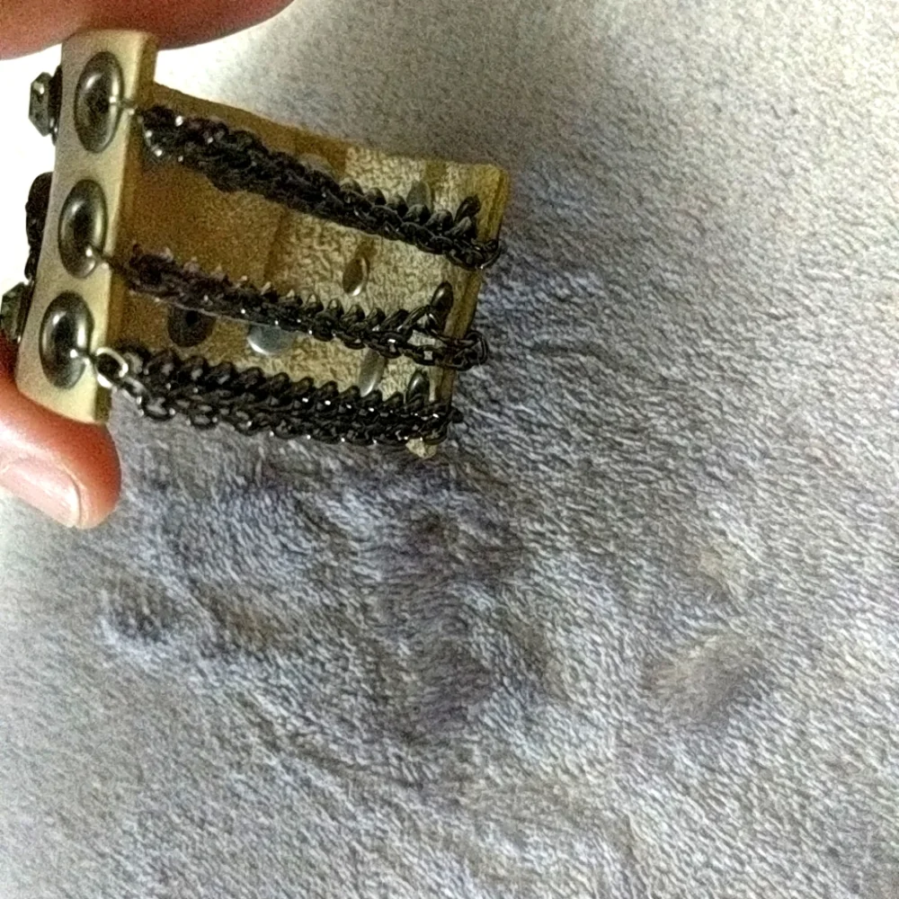 Skull & Bones bracelet with rhinestones and chains.  Snap closure, leather. - Picture 3 of 6